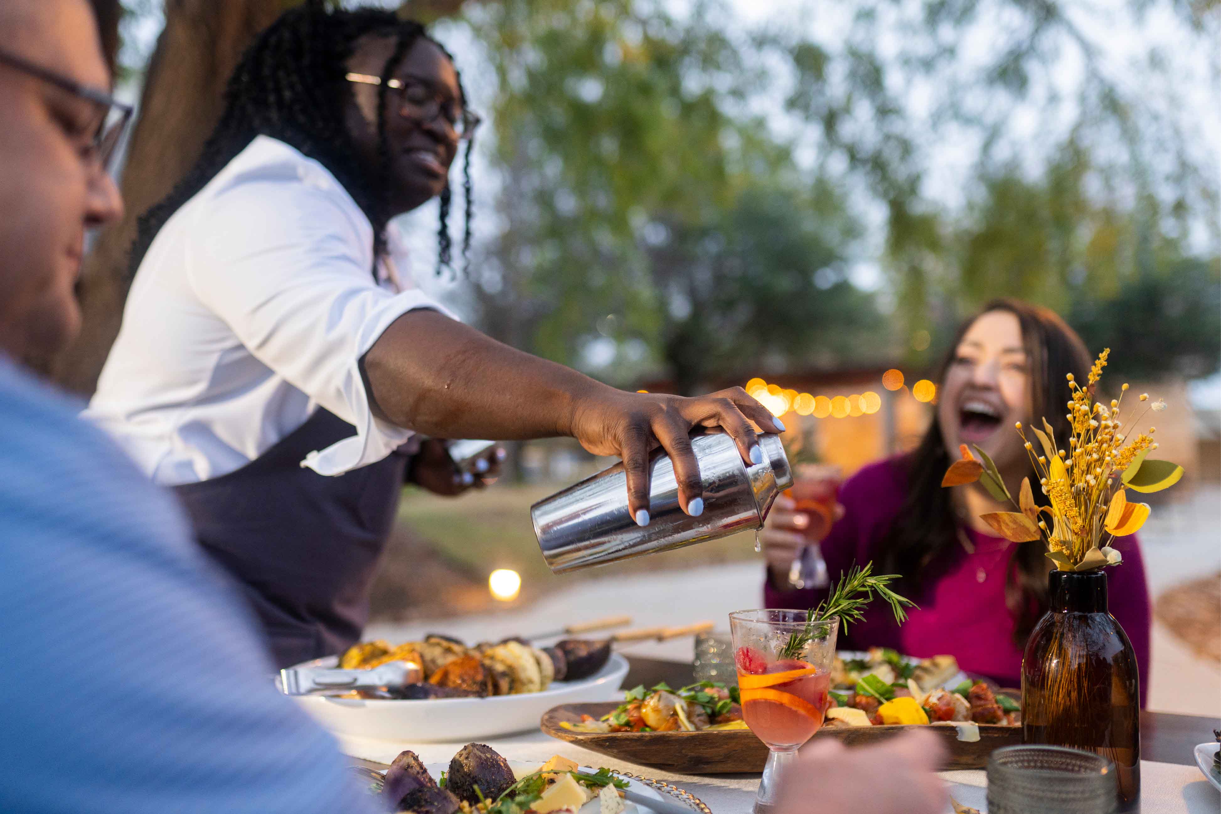 chef serving a beverage in shaker